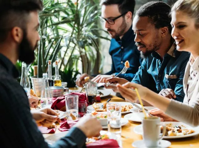 Group of peoples eating at a restaurant