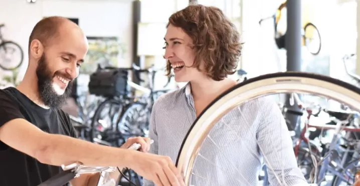 People fixing a bike