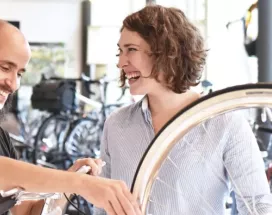 People fixing a bike