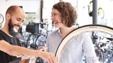 People fixing a bike