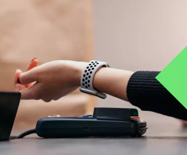 Someone paying with a watch